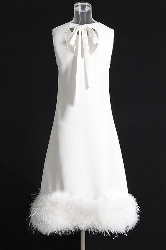 Sleeveless bandage hem stitching feather dress