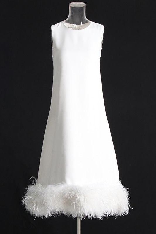 Sleeveless bandage hem stitching feather dress