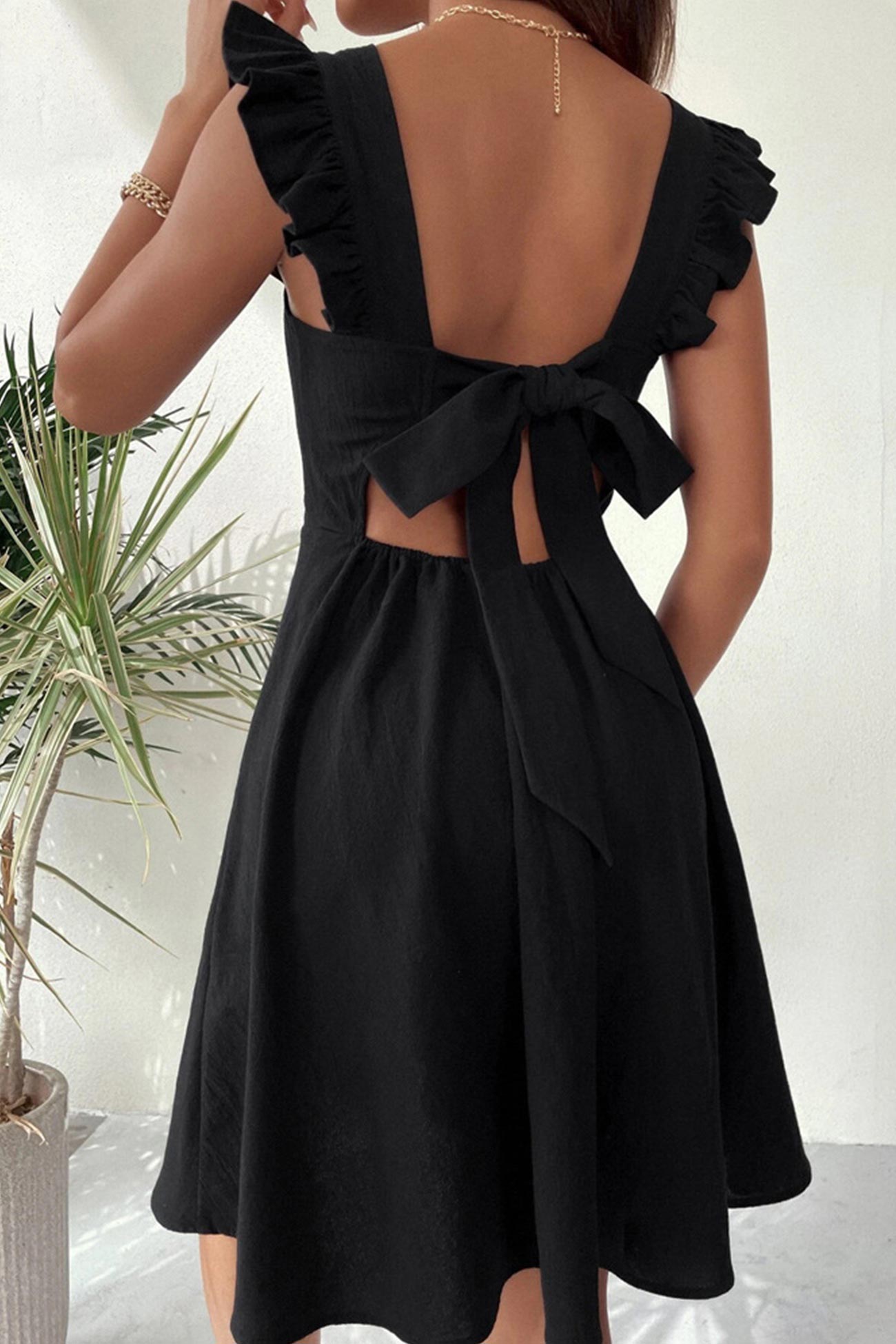 Ruffle Sleeveless Tie-back Mini Dress